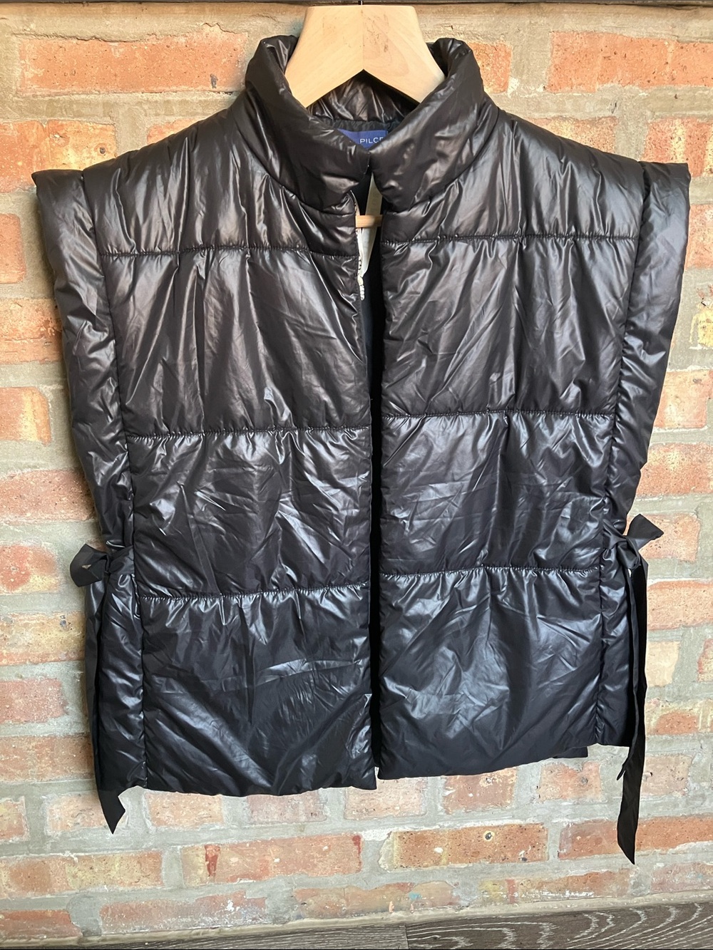 Anthropologie x Pilcro packable side-tie black puffer vest